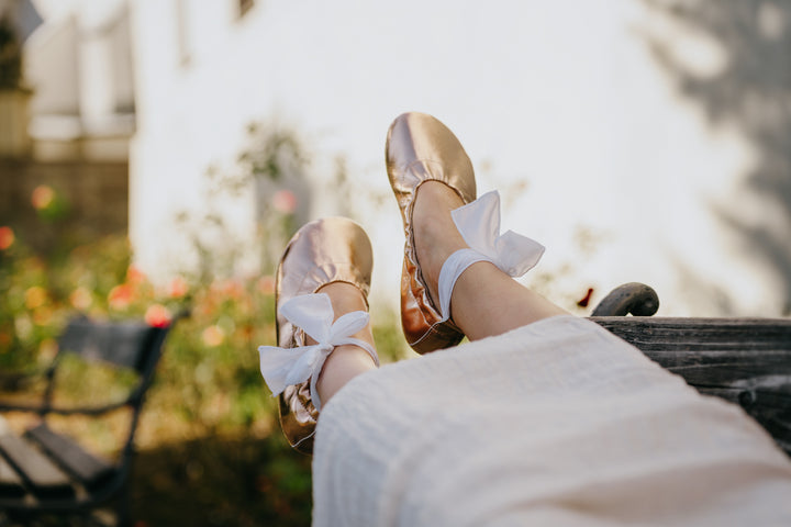 white ballet flats with ribbon